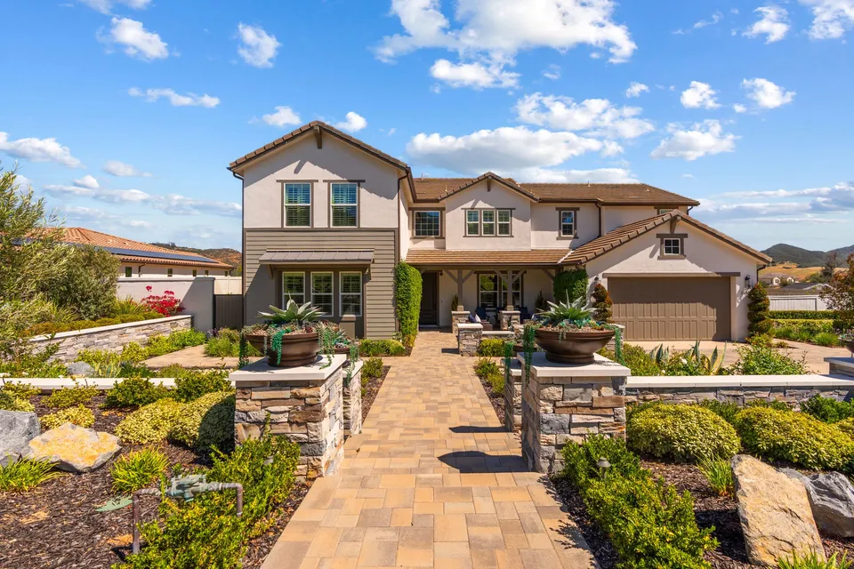 Front walk through drought-tolerant gardens
