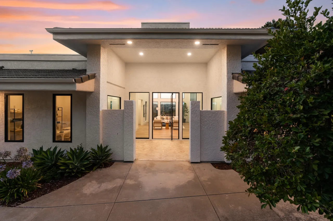 Front entry and courtyard at dusk