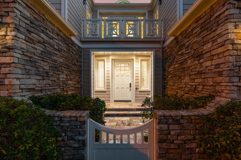 Gated front entry at dusk