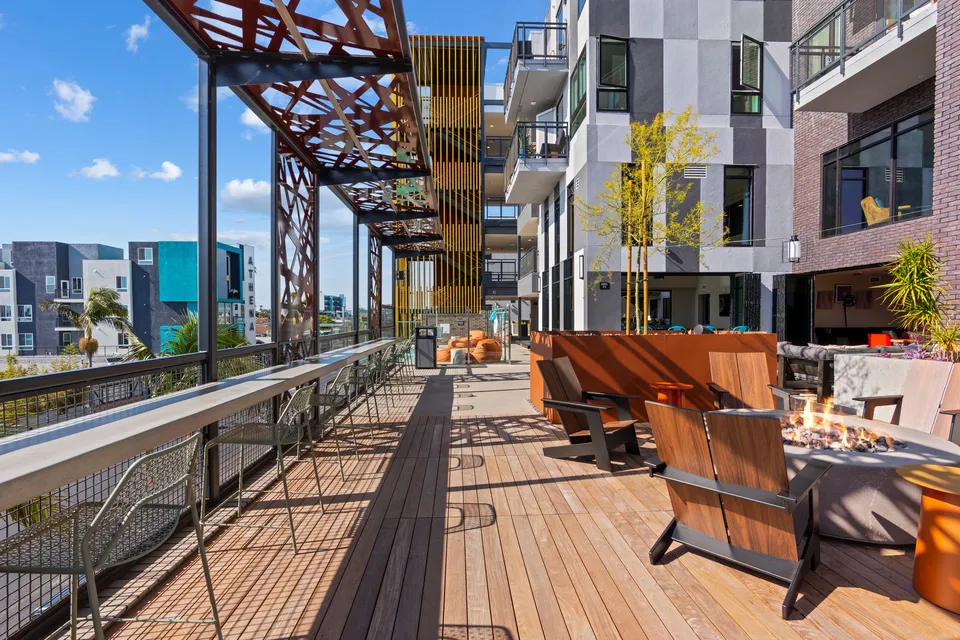 Rooftop deck with fire pits and lounge chairs