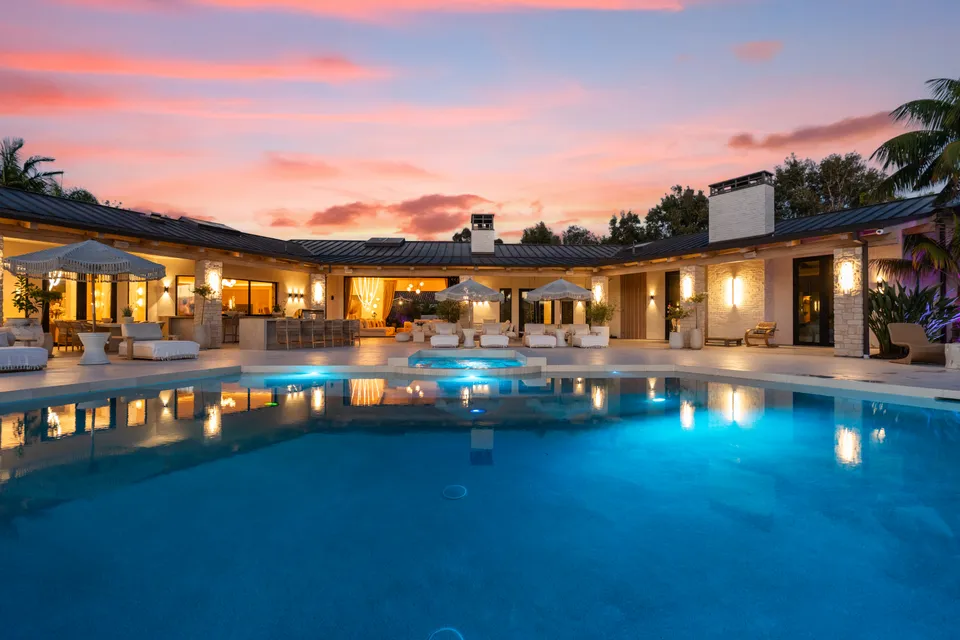 Pool and home at twilight