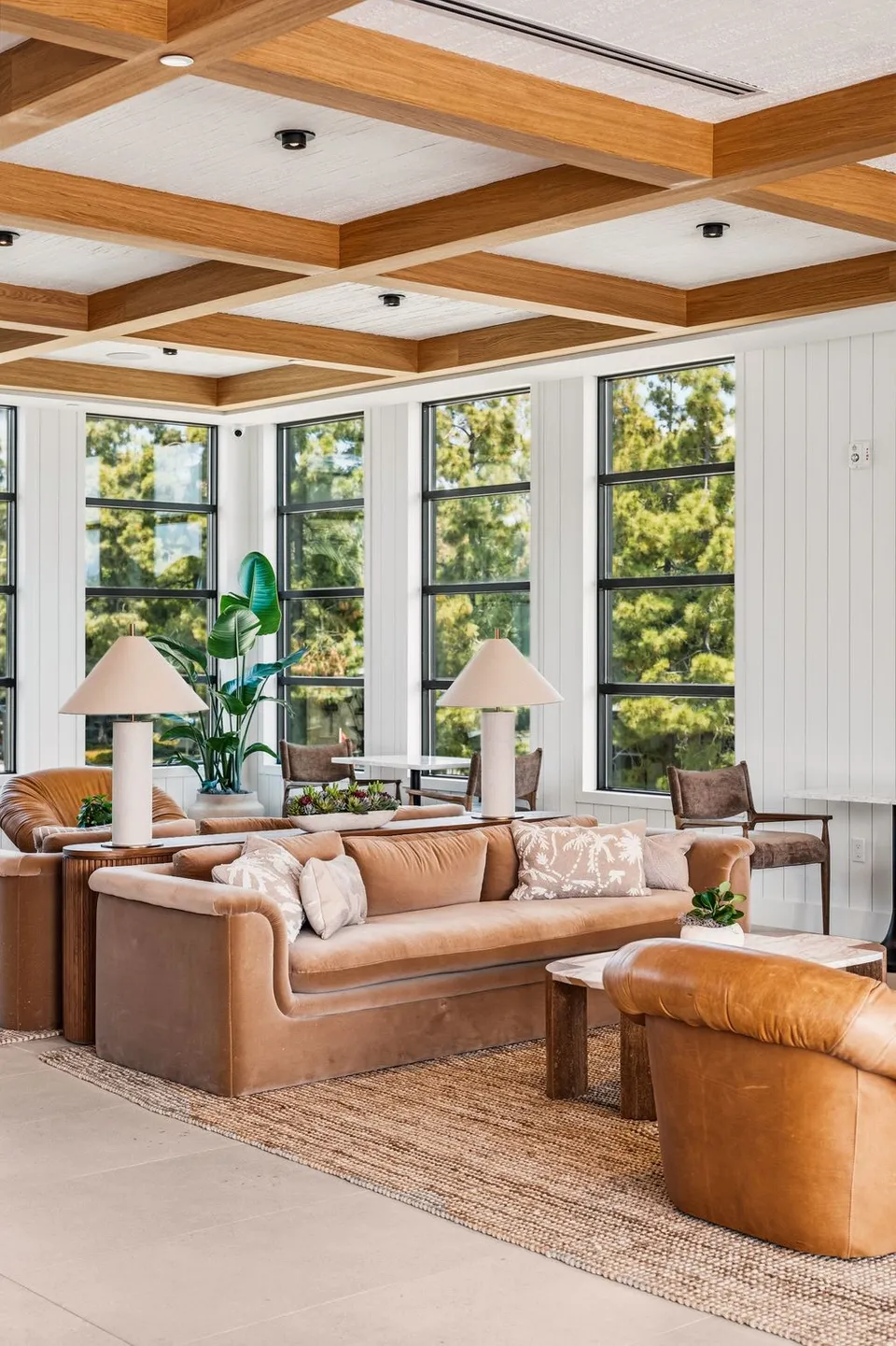 Clubhouse lounge seating by the windows